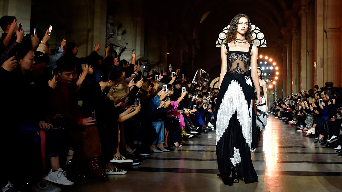 Models present creations by Givenchy, during the women`s 2018 Spring/Summer ready-to-wear collection fashion show in Paris, on 1 October 2017. Photo:  AFP