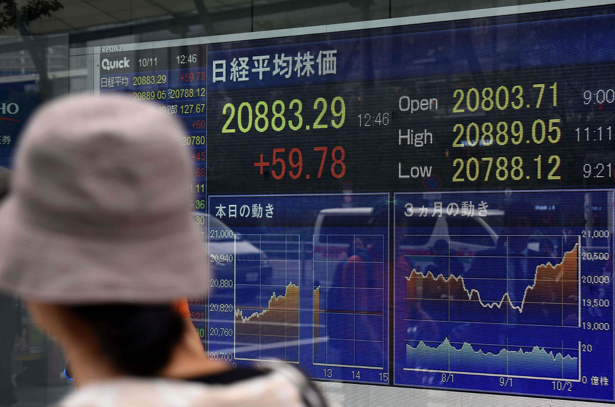 An electronics stocks indicator displays share prices of the Tokyo Stock Exchange in Tokyo on Wednesday. AFP