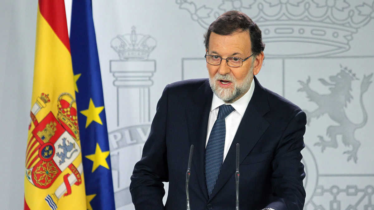Spain`s prime minister Mariano Rajoy gives a press conference after a crisis cabinet meeting at the Moncloa Palace on 11 October 2017 in Madrid. Photo: AFP