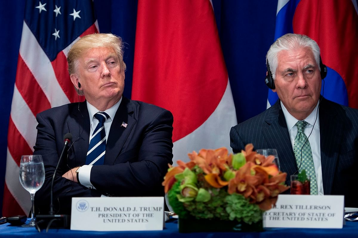 This file photo taken on 21 September, 2017 shows US President Donald Trump (L) and US Secretary of State Rex Tillerson listening to statements before a luncheon with US, Korean, and Japanese leaders at the Palace Hotel during the 72nd United Nations General Assembly in New York City. Photo: AFP