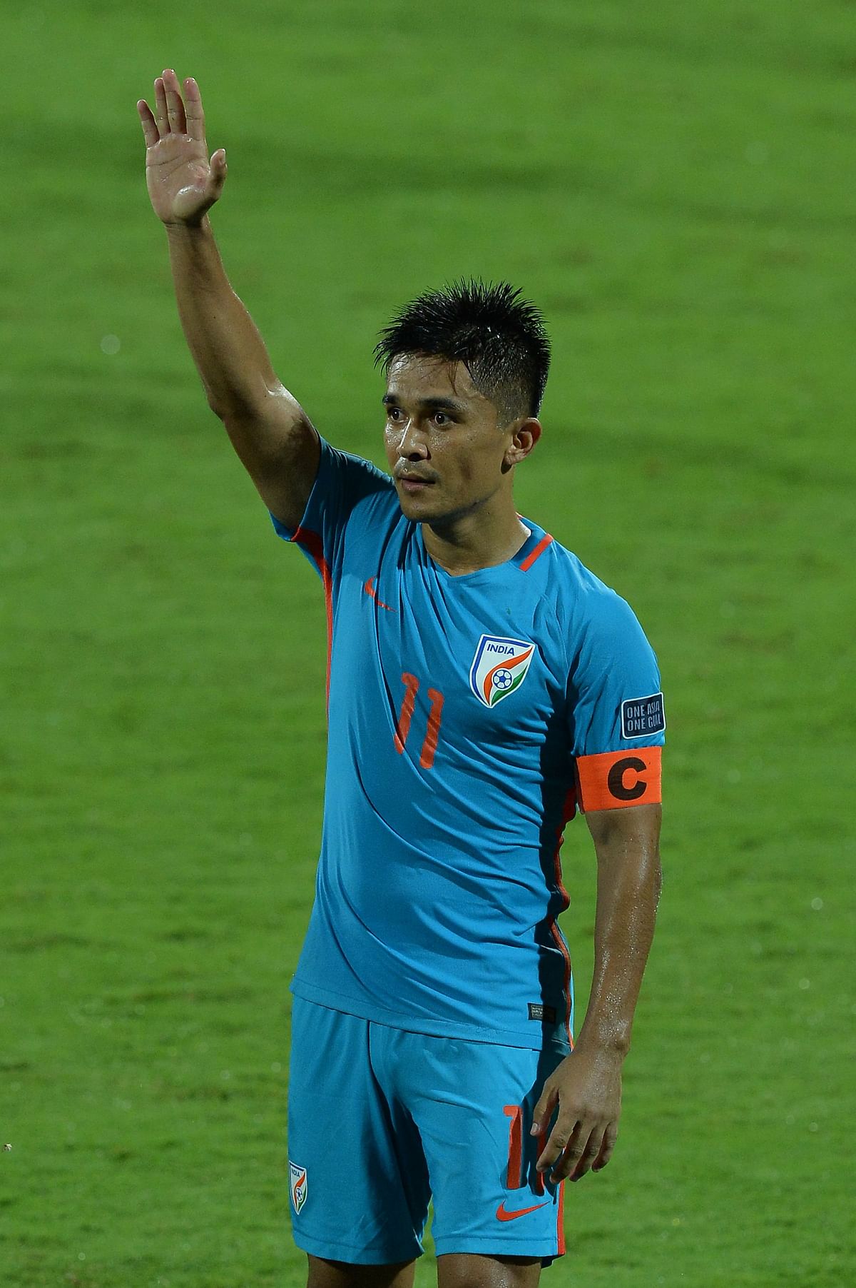 Indian football team captain Sunil Chhetri thanks the fans after the 4-1 victory over Macau during the 2019 AFC Asian Cup qualifying match at the Kanteerava Stadium in Bangalore on Wednesday. AFP