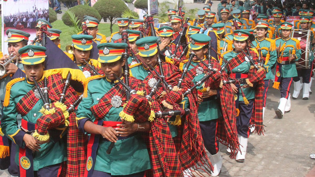 A police band party starts parading on the eve of Community Police Day at Dhaka Metropolitan Police (DMP) headquarters in Ramna, Dhaka on 28 October 2017. Photo: Hasan Raja