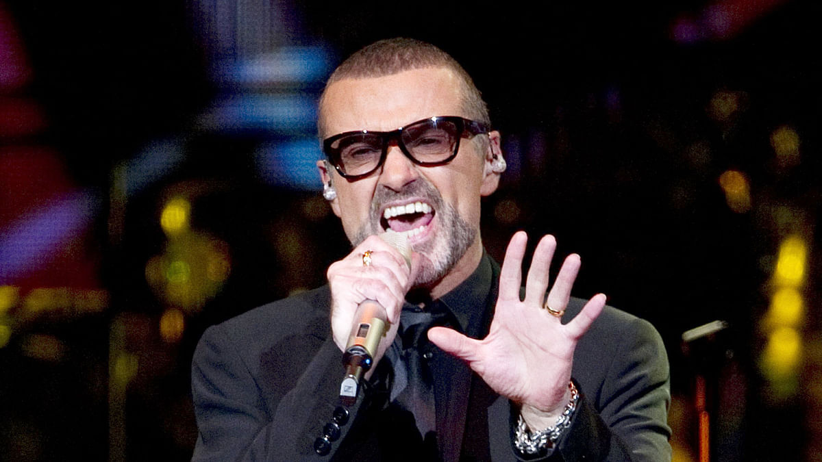 This file photo taken on 05 September, 2011 shows British singer George Michael performs on stage during his new European tour, “Symphonica` at the O2 Arena in Berlin. Photo: AFP