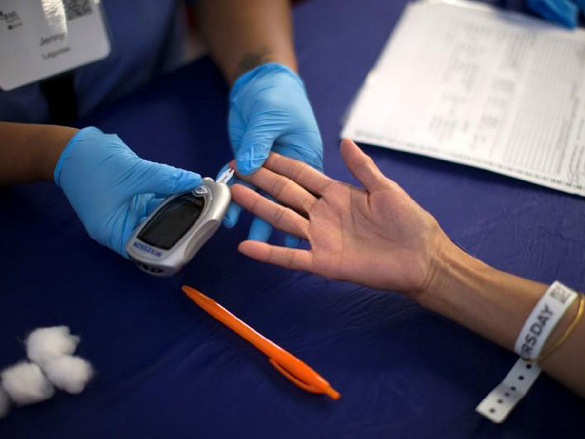 A person receives a test for diabetes during Care Harbor LA free medical clinic in Los Angeles, California on 11 September 2014. Reuters