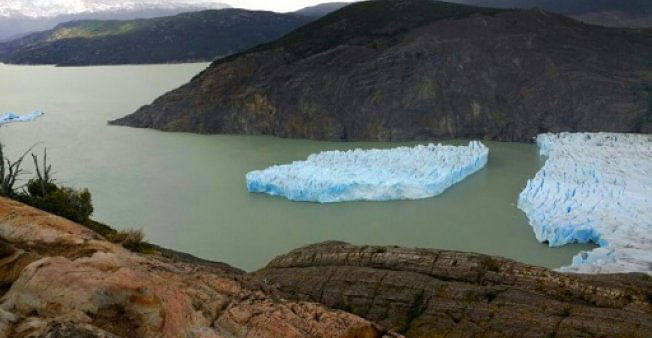 A large piece detaches from the Grey Glacier in Chile’s far southern Patagonia region, as seen on 28 November 2017 in this handout released by Chile’s National Forest Corporation (CONAF). AFP file photo
