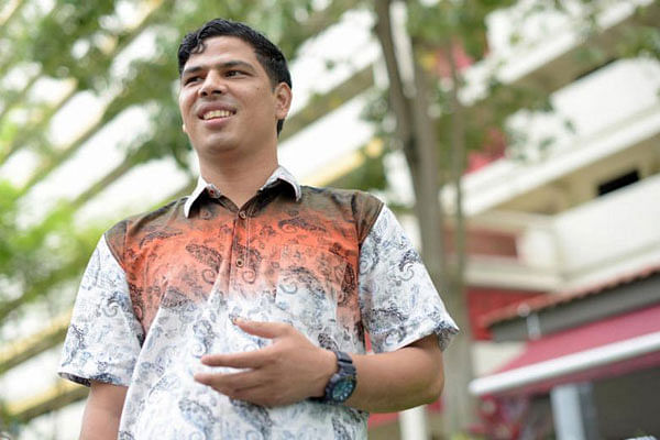 Construction worker Md Mukul Hossine shot to fame after his poems, many of which were written late at night in his dormitory or even scribbled on bags on cement, were published last year in the collection Me Migrant by Ethos Books. Photo: The Straits Times/ Lim Sin Thai