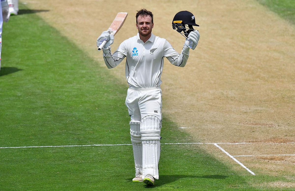 New Zealand’s Tom Blundell celebrates 100 runs during day three of the first Test cricket match between New Zealand and the West Indies at the Basin Reserve in Wellington on Sunday. Photo: AFP