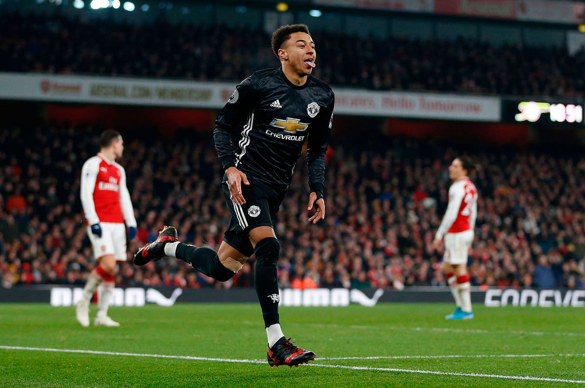 Manchester United’s English midfielder Jesse Lingard celebrates scoring his team’s third goal during the English Premier League football match between Arsenal and Manchester United at the Emirates Stadium in London on Saturday. Photo: AFP