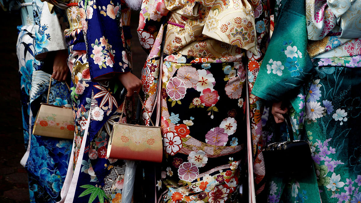 Japanese women wearing kimonos attend their Coming of Age Day celebration ceremony at an amusement park in Tokyo, Japan on 9 January 2017. Photo: Reuters