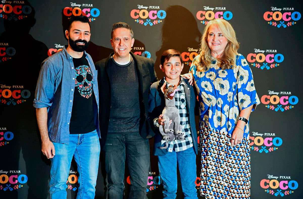 This file photo taken on 24 October, 2017 shows (L to R) Mexican-American co-director Adrian Molina, US director Lee Unkrich, Mexican singer and actor Luis Angel Gomez and US producer Darla K Anderson during a press conference in Mexico City for `Coco` a new animated film from Disney-Pixar inspired by Mexico`s Day of the Dead. Photo: AFP