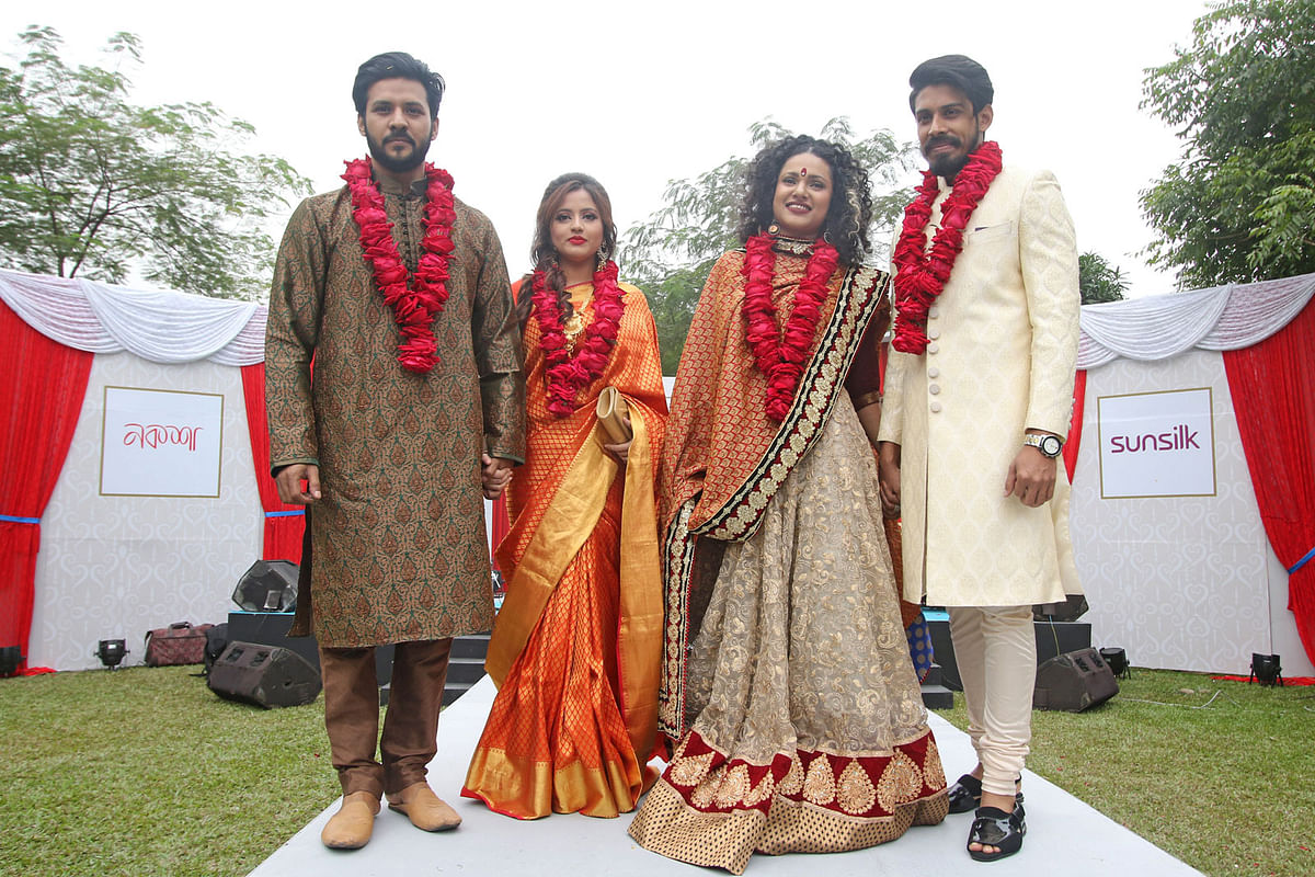 Wedding festival was inaugurated at the Oasis premise of Pan Pacific Sonargaon Hotel at 10am on Tuesday. Couple Imi and Nirob exchange garlands at the begining of the ceremony. Photo: Saiful Islam