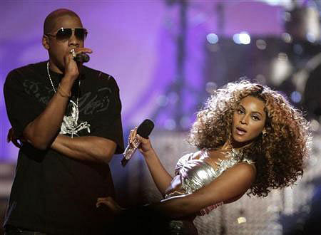 R&B artist Beyonce (R) performs `deja vu` with rap artist Jay-Z at the 2006 BET Awards at the Shrine Auditorium in Los Angeles on 27 June 2006. Reuters