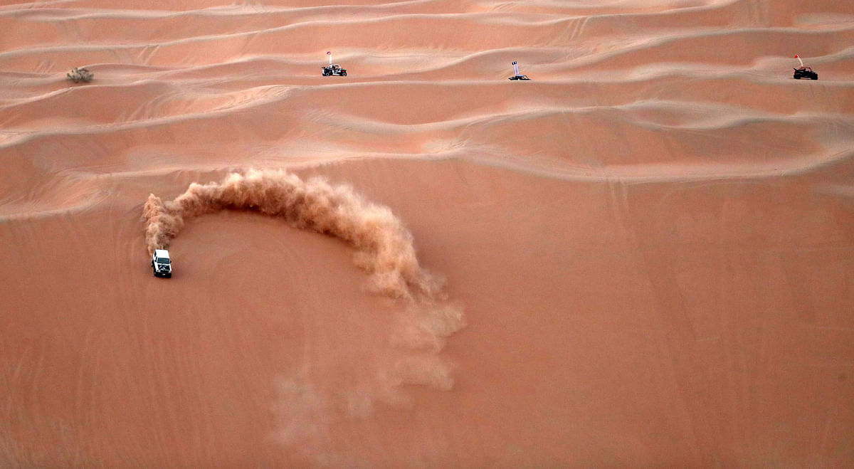 A dune buggy practices during a sand dune racing at the Liwa 2018 Moreeb Dune Festival on 1 January 2018, in the Liwa desert, some 250 kilometres west of the Gulf emirate of Abu Dhabi. Photo: AFP