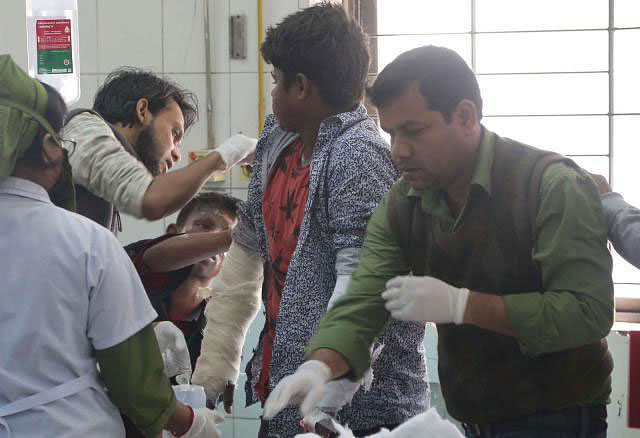 The injured are under treatment at Dhaka Medical College hospital burn unit on Saturday. Photo: Hasan Raja