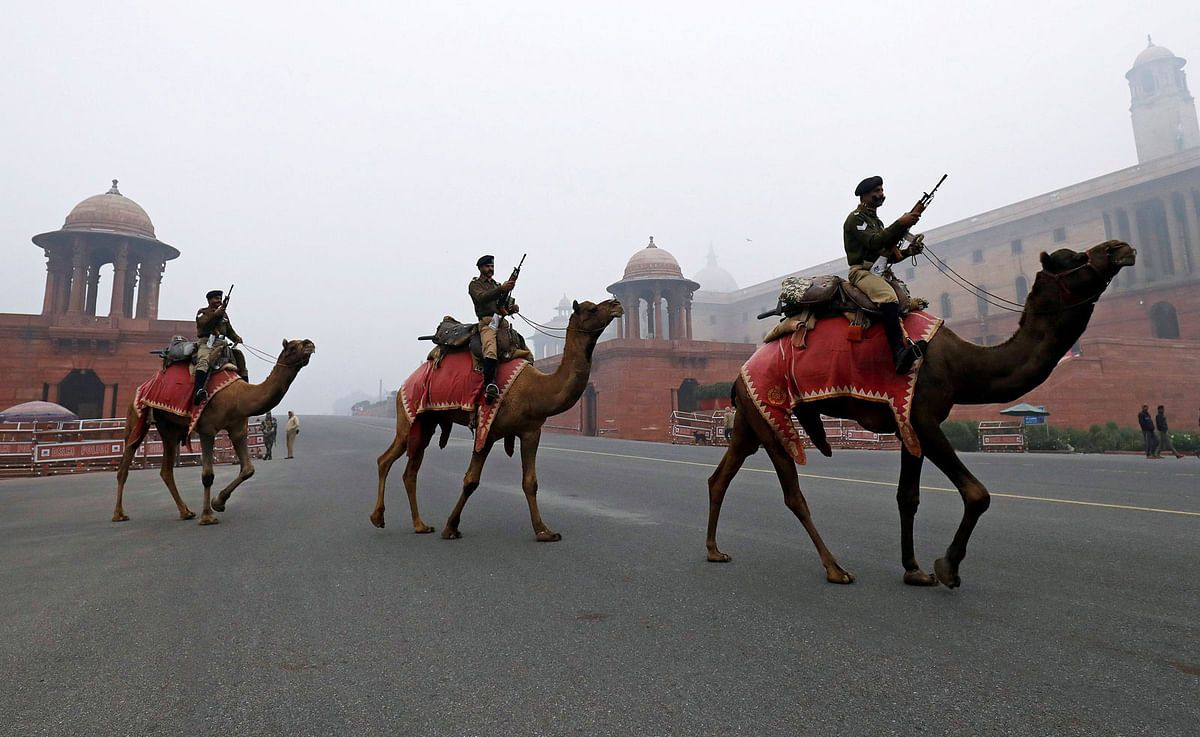 Members of the Indian Border Security Force (BSF) ride camels during rehearsals for the Republic Day parade in New Delhi, India on 5 January 2016. Photo: Reuters