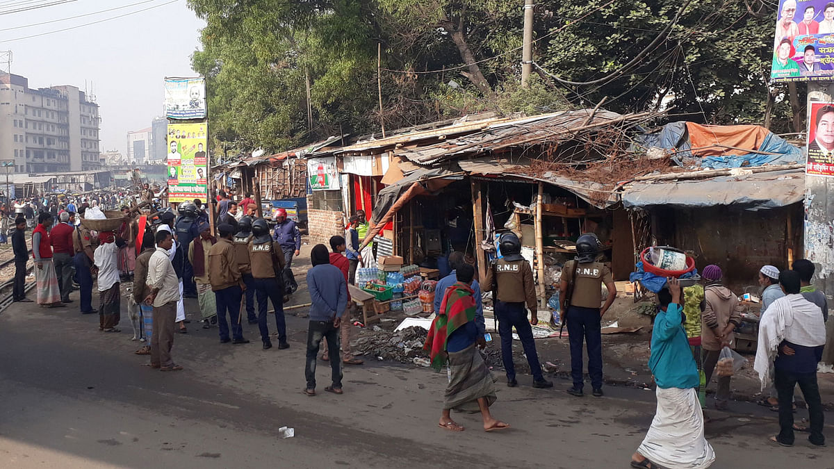 Dhaka North City Corporation (DNCC) conducts an eviction drive in the capital`s Karwan Bazar area on 9 January. Photo: Al Imran