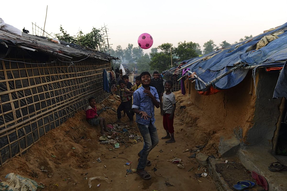 Rohingya refugee children play near their home in Kutupalong refugee camp in the Bangladeshi district of Ukhia on 8 January 2018. Photo: AFP