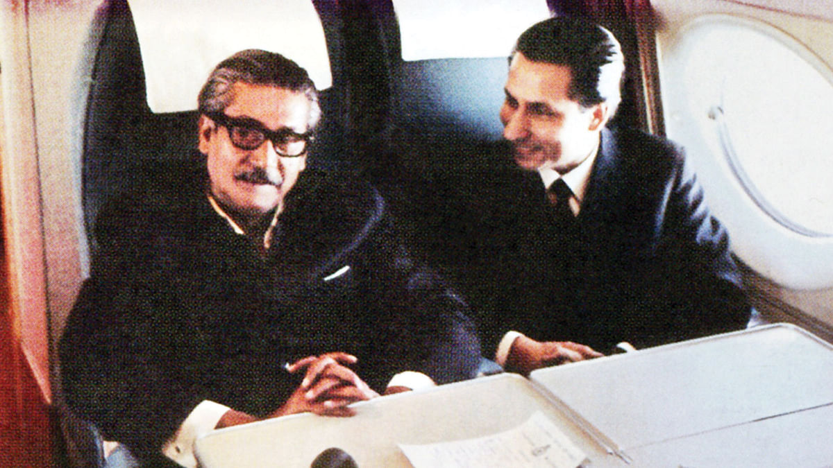 Father of the Nation Bangabandhu Sheikh Mujibur Rahman is with the then Indian diplomat, Shashank Banerjee, (R) while returning home on 10 January 1972, after being released from internment in Pakistan.