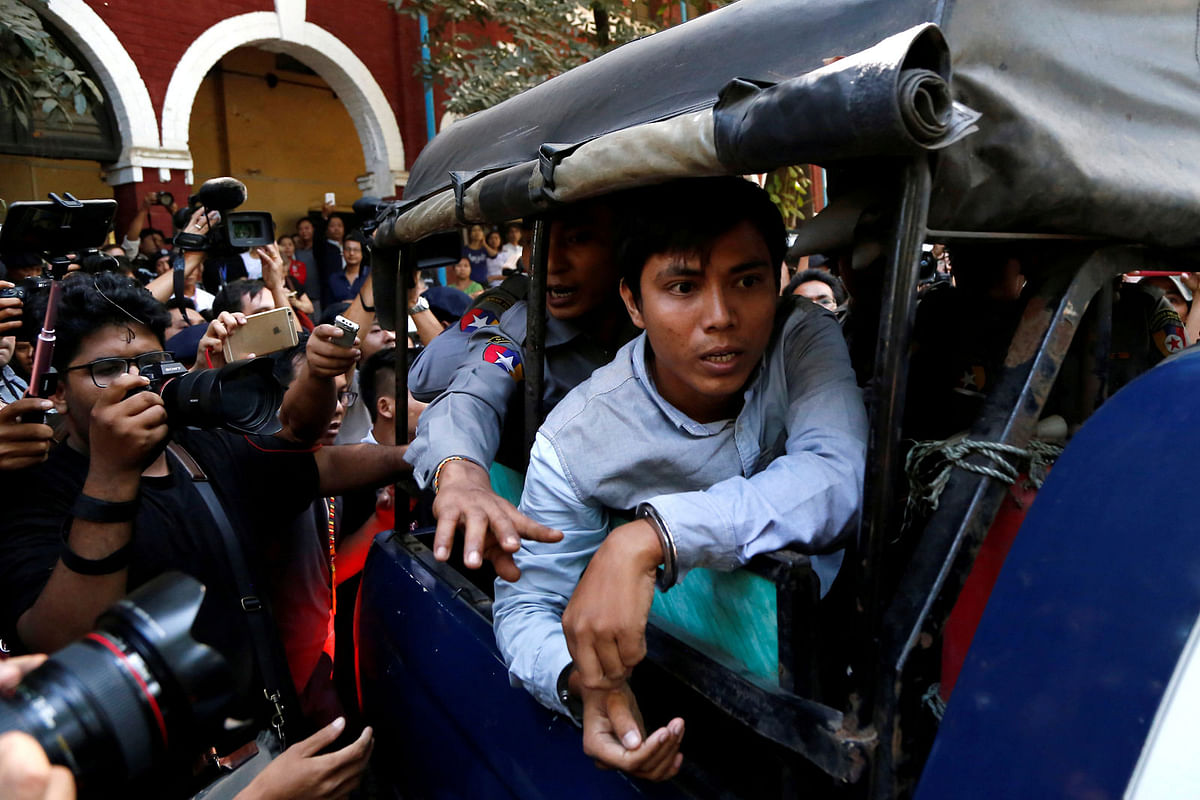 Reuters journalist Kyaw Soe Oo arrives at the court in Yangon, Myanmar. Reuters