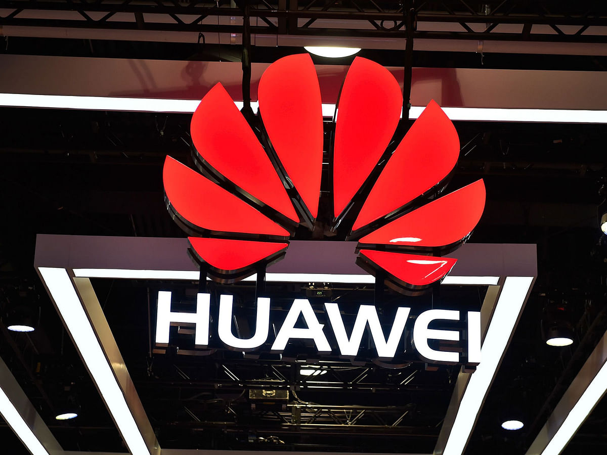 The Huawei logo is display during CES 2018 at the Las Vegas Convention Center on 9 January. Photo: AFP