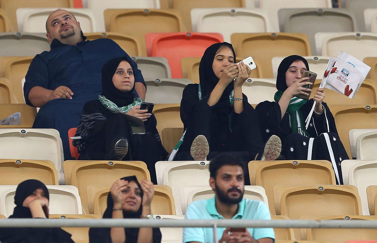 Female Saudi supporters of Al-Ahli attend their teams football match against Al-Batin in the Saudi Pro League at the King Abdullah Sports City in Jeddah on Friday. AFP