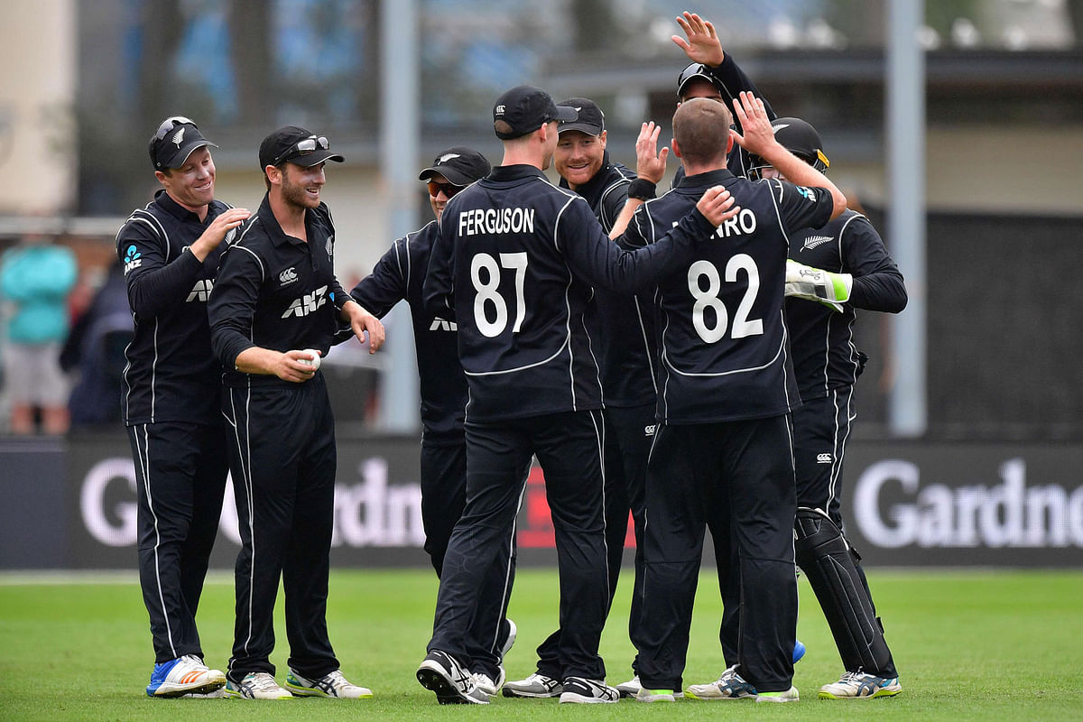 New Zealand players celebrate Pakistan`s Hasan Ali being caught during the third one day international cricket match between New Zealand and Pakistan at University Oval in Dunedin on 13 January 2018. AFP