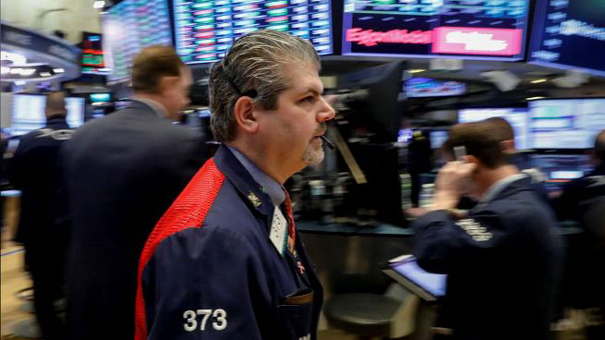 Traders work on the floor of the New York stock exchange on 8 January 2018. Reuters