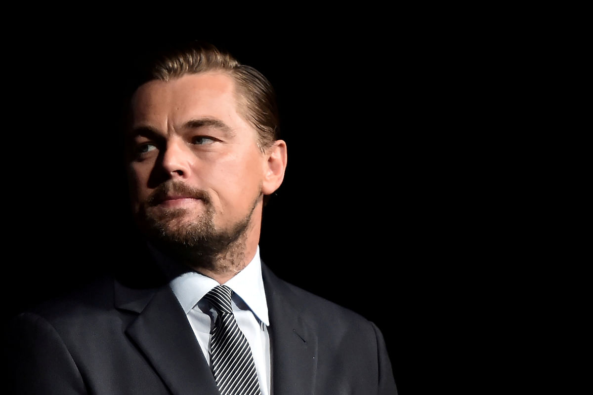 US actor Leonardo DiCaprio looks on prior to speaking on stage during the Paris premiere of the documentary film 'Before the Flood' at the Theatre du Chatelet in Paris, France on 17 October, 2016. Photo: Reuters