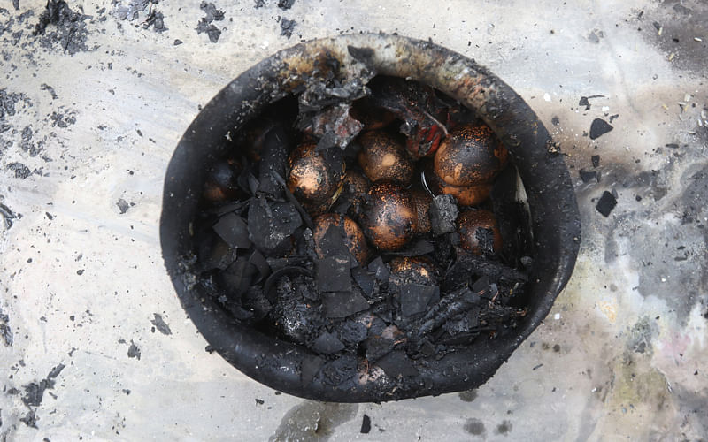 A pot of eggs, burnt and blackened. Photo: Abdus Salam
