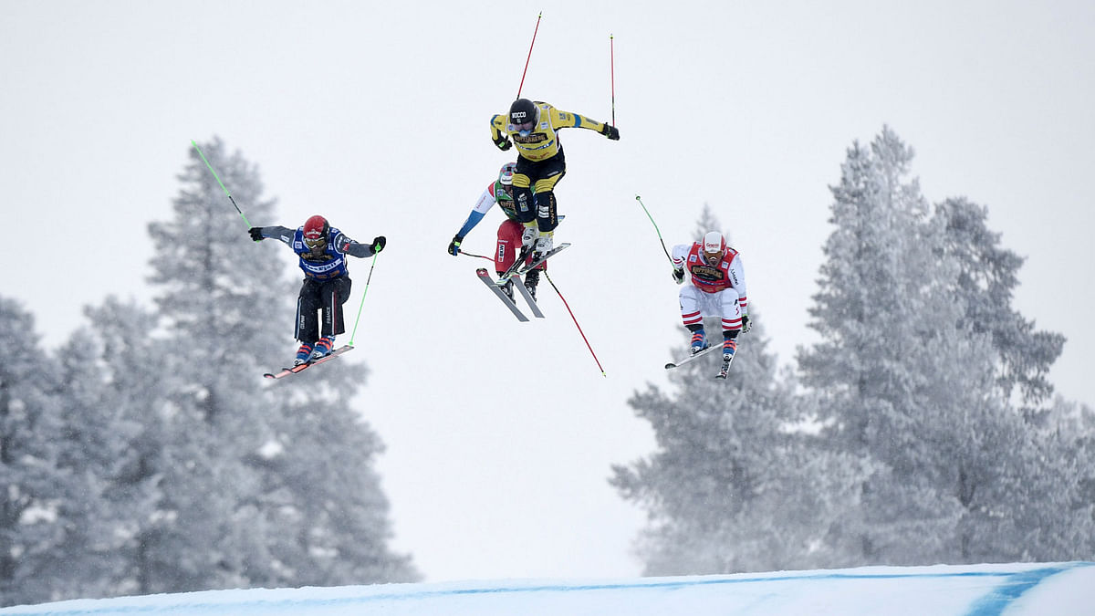 Jonas Devouassoux of France, Alex Fiva of Switzerland, Victor Oehling Norberg of Sweden and Adam Kappacher of Austria compete during the men’s freestyle ski cross in Idre Fjall, Sweden on 14 January 2018. Photo: Reuters