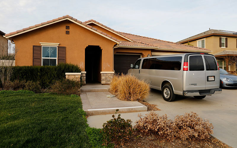 A van sits parked on the driveway of the home of the Turpins in Perris, California, US. Photo: Reuters