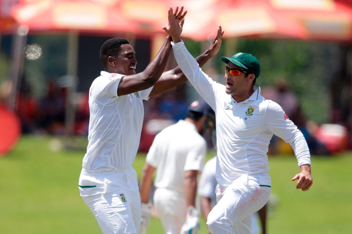 outh African bowler Lungi Ngidi (L) celebrates the dismissal of Indian batsman Hardik Pandya (not pictured) during the fifth day of the second Test cricket match between South Africa and India at Supersport cricket ground on January 17, 2018 in Centurion. AFP