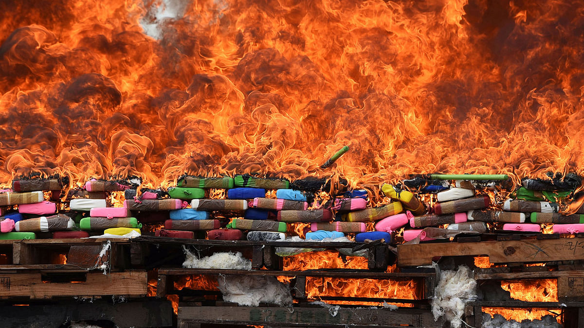 Cocaine packages, seized during different army operations, are incinerated at a `Las Bajadas` Naval Air Base in Mexico on 16 January. Photo: Reuters