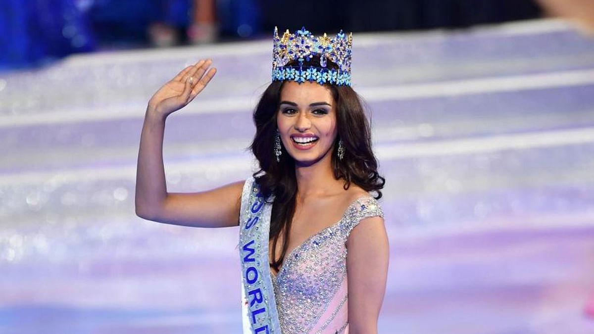 India`s Manushi Chillar celebrates after winning the Miss World 2017 pageant in Sanya, China on 18 November 2017. Photo: IANS