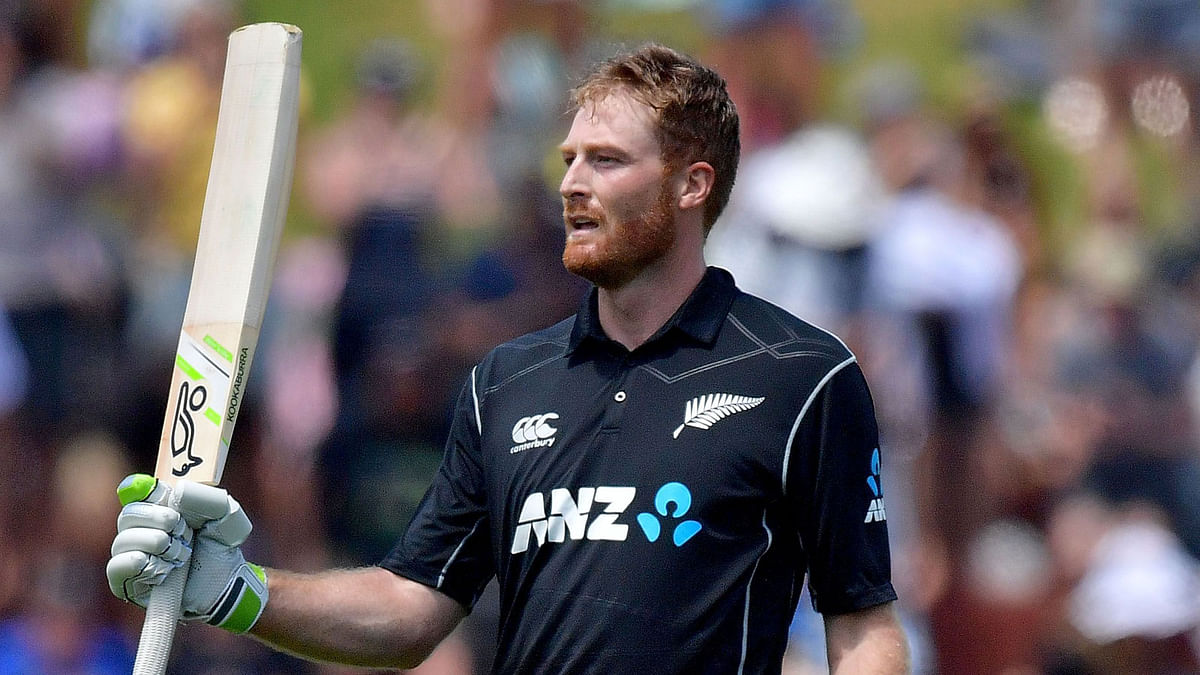 New Zealand`s Martin Guptill celebrates 100 runs during the 5th one-day international cricket match between New Zealand and Pakistan at the Basin Reserve in Wellington on 19 January 2018. AFP