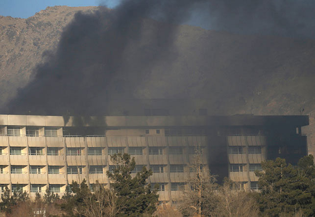 Smoke rises from the Intercontinental Hotel during an attack in Kabul, Afghanistan. Photo: Reuters