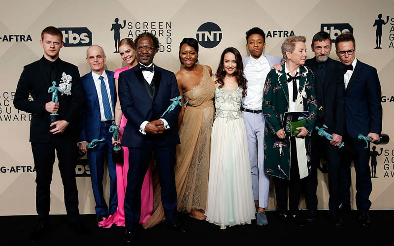 The cast of `Three Billboards Outside Ebbing, Missouri` poses backstage with their award for Outstanding Cast in a Motion Picture. Photo: Reuters