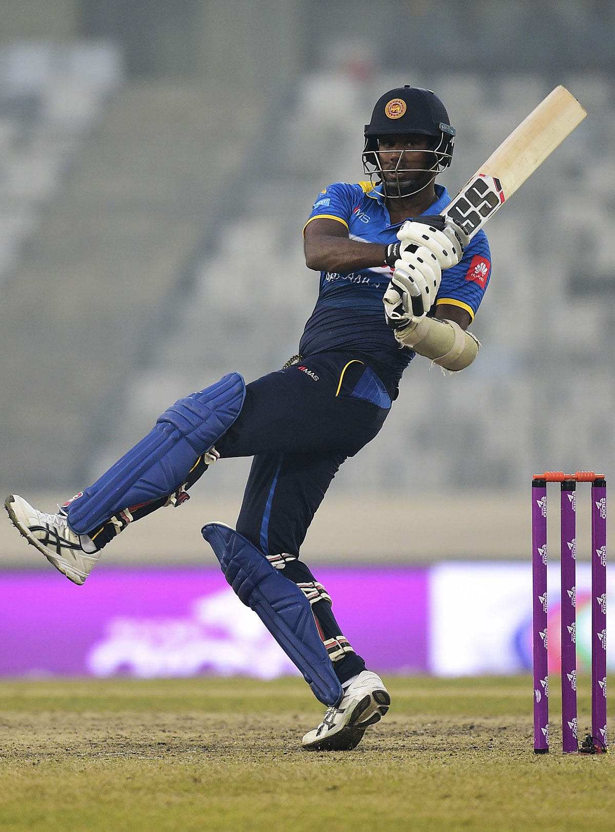 This file photo taken on 17 January, 2018 shows Sri Lanka cricket captain Angelo Mathews playing a shot during the second One Day International (ODI) cricket match of the Tri-Nations Series between Sri Lanka and Zimbabwe at the Sher-e-Bangla National Cricket Stadium in Dhaka. Photo: AFP