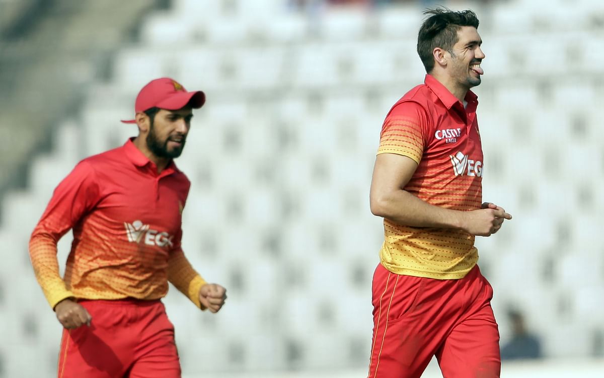 Zimbabwe captain Graeme Cremer, right, bagged four wickets to derail the Bangladesh batting. AFP