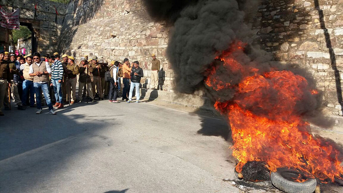 A view of tyres burnt by the members of Karni Sena during a protest on the eve of the screening of Sanjay Leela Bhansali`s film `Padmavat`; in Rajasthan`s Chittorgarh on 24 Jan 2018. Photo: IANS