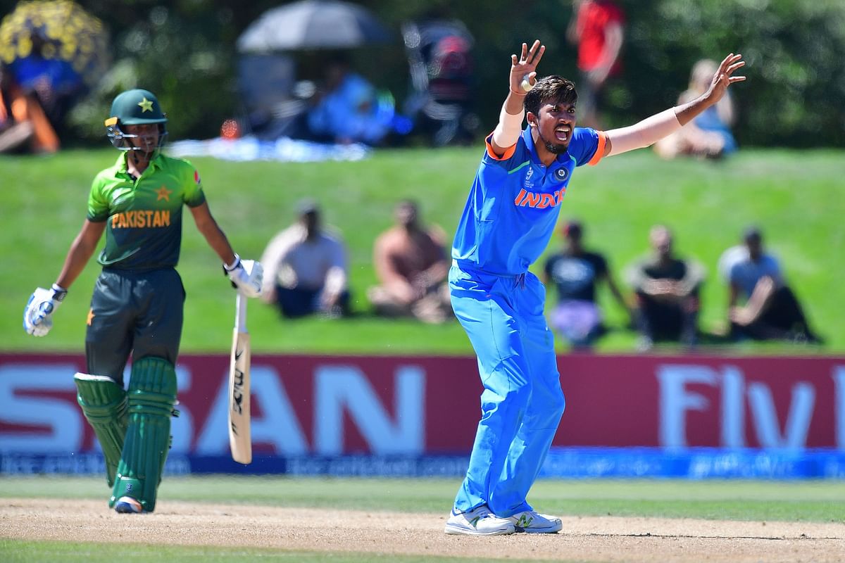 India`s Ishan Porel (R) appeals for a leg-before-wicket call on Pakistan`s Ammad Alam (L) during the U19 World Cup semi-final at Hagley Oval in Christchurch on Tuesday. AFP