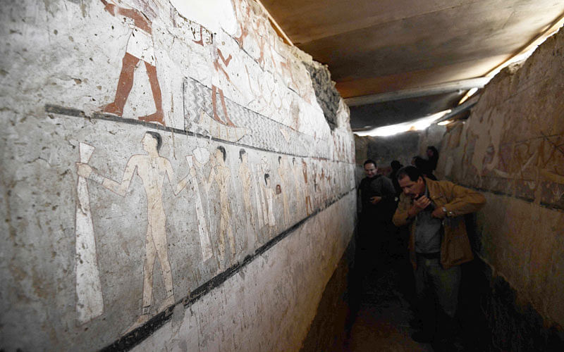 A general view shows well-preserved and rare wall paintings inside the tomb of an Old Kingdom priestess on the Giza plateau on the southern outskirts of Cairo, that was unveiled on 3 February. Photo: AFP