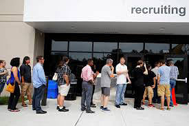 Job seekers line up to apply during `Amazon Jobs Day,` a job fair being held at 10 fulfillment centers across the United States aimed at filling more than 50,000 jobs, at the Amazon.com Fulfillment Center in Fall River, Massachusetts, US. Reuters file photo