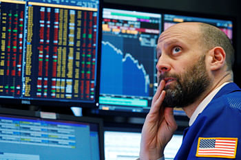 A trader reacts as he watches screens on the floor of the New York Stock Exchange in New York, US. Photo: Reuters