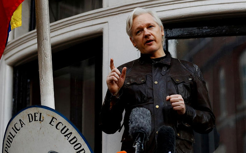 WikiLeaks founder Julian Assange is seen on the balcony of the Ecuadorian embassy in London, Britain, on 19 May 2017. -- Reuters