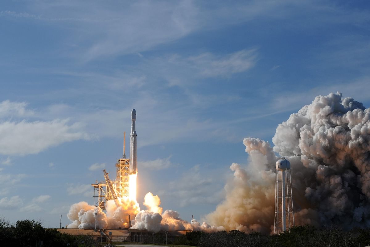 The SpaceX Falcon Heavy launches from Pad 39A at the Kennedy Space Center in Florida, on 6 February 2018, on its demonstration mission. The world`s most powerful rocket, SpaceX`s Falcon Heavy, blasted off Tuesday on its highly anticipated maiden test flight, carrying CEO Elon Musk`s cherry red Tesla roadster to an orbit near Mars. Screams and cheers erupted at Cape Canaveral, Florida as the massive rocket fired its 27 engines and rumbled into the blue sky over the same NASA launch pad that served as a base for the US missions to Moon four decades ago. Photo: AFP