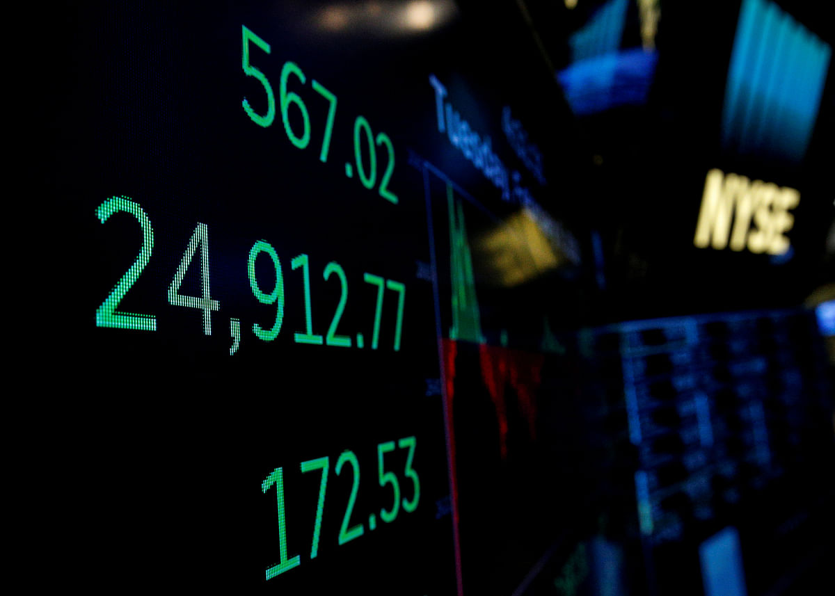 A screen displays the Dow Jones Industrial Average after the closing bell on the floor of the NYSE in New York. Photo: Reuters