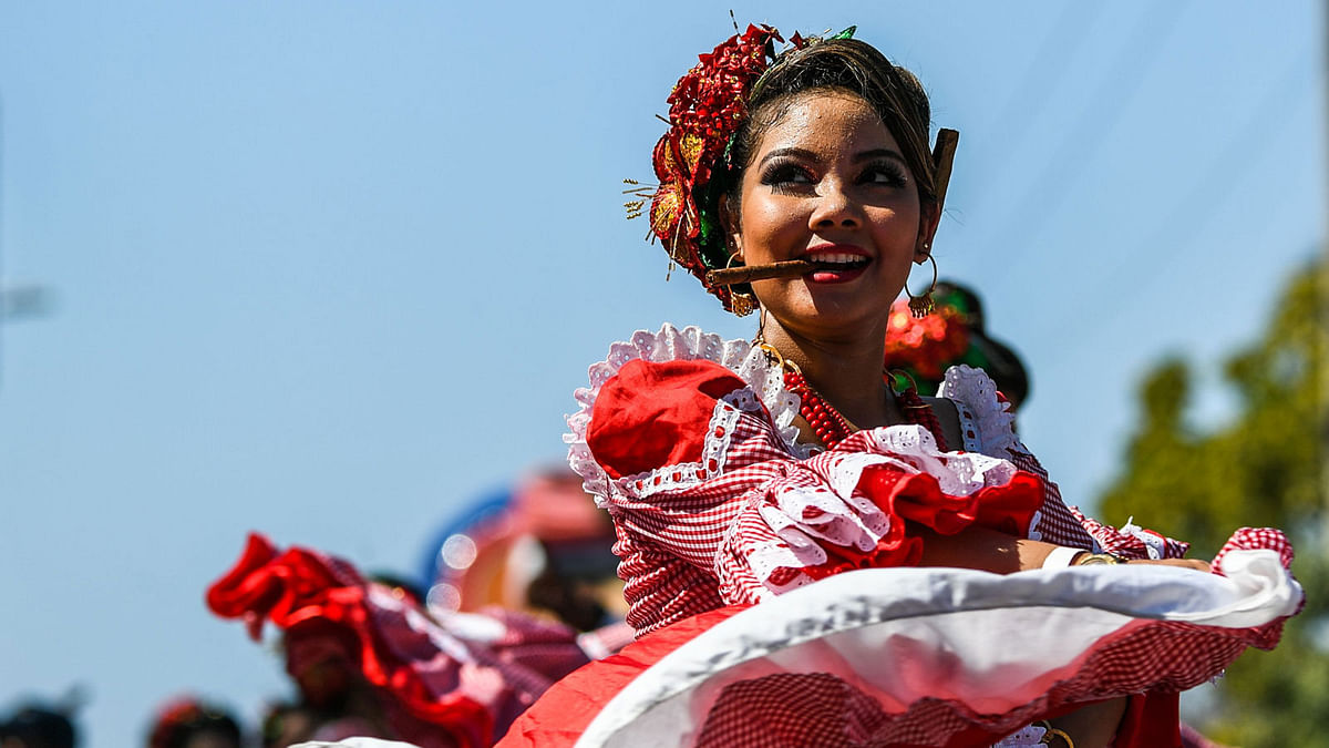 A reveller performs during Barranquilla`s Carnival parade in Barranquilla, Colombia, on 10 February 2018. Photo: AFP