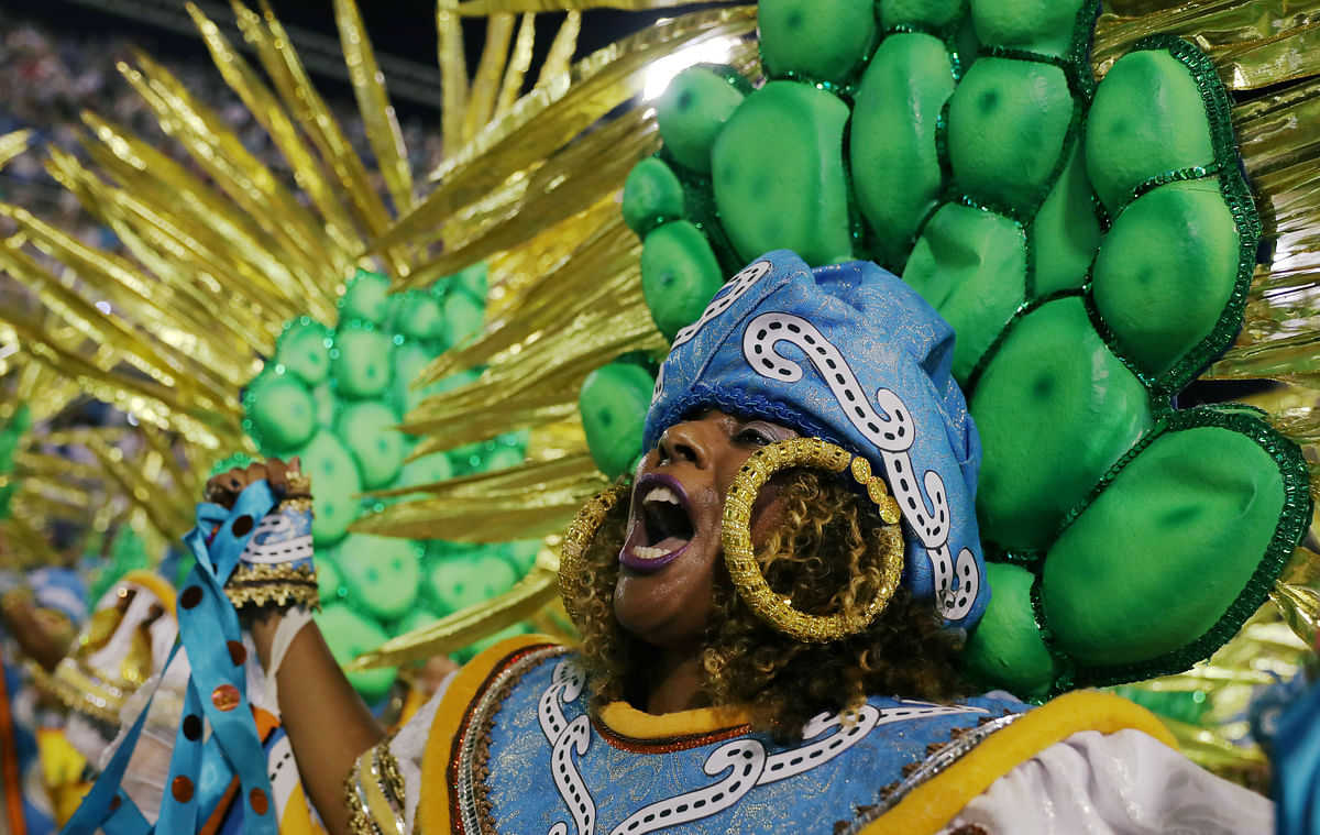 Reveller from Portela Samba school performs during the second night of the Carnival parade at the Sambadrome in Rio de Janeiro. Photo: Reuters