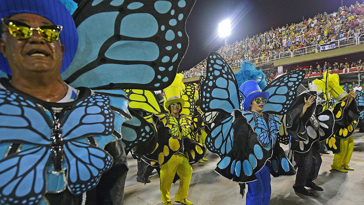 Revellers of the Imperatriz Leopoldinense samba school perform during the second night of Rio`s Carnival at the Sambadrome in Rio de Janeiro, Brazil, on 13 February, 2018. Photo: AFP